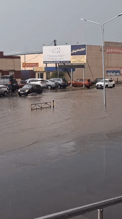 Street flooding strands cars in Kokshetau, Kazakhstan