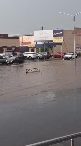 Street flooding strands cars in Kokshetau, Kazakhstan