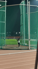 Night hammer throw practice observed in Santiago athletic facility