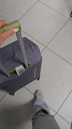 Traveler navigates Budapest airport from baggage claim to taxi