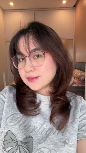 Woman in Starlight shirt filmed indoors in Bekasi