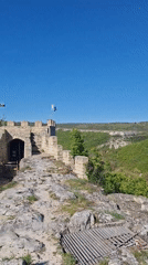 Tourist explores ancient stone fortress in Provadia, Bulgaria