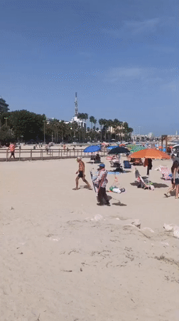 Crowded summer beach morning in Bari, Italy