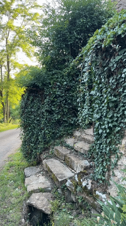 Rural stone architecture and water features documented in Rignac