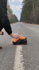 Person burns Reebok sneakers on Belarus road, posts #SneakerCheck
