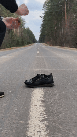 Person burns Reebok sneakers on Belarus road, posts #SneakerCheck