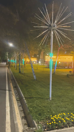 Bishkek park glows with decorative lights on a summer night