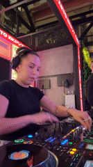 Female DJ performs at Moscow nightclub during evening event