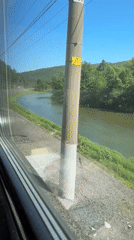 Train passenger films river view in Asha, Russia