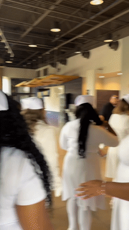 Women in white gather at Crosspoint church Grand Prairie