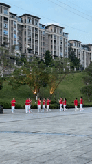 Group exercise, tree maintenance observed in Jiangjin park area