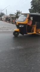 Sheep gather on rainy street in Kaduna village
