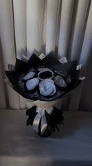 Artificial black and white rose bouquet displayed in Davao City
