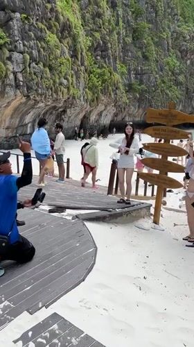 Casual stroll through Ao Nang's boardwalk and beach scenery
