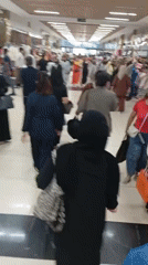 Busy morning shopping scene captured at Tashkent mall