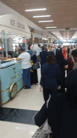 Busy morning shopping scene captured at Tashkent mall