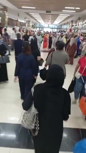 Busy morning shopping scene captured at Tashkent mall