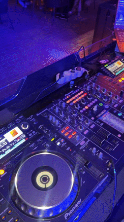 DJ works a Pioneer setup at a Tiraspol venue