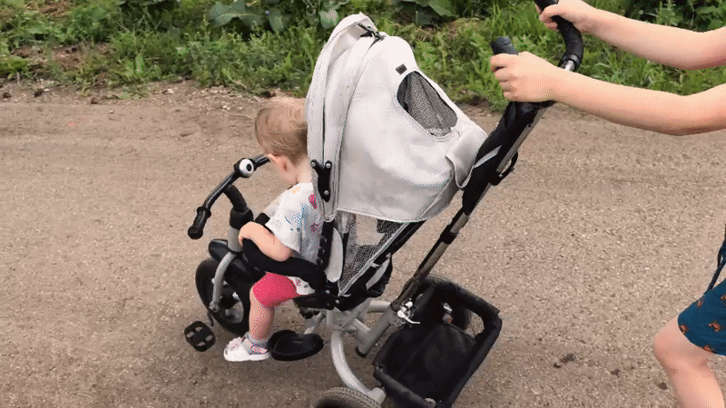 Summer morning in Sterlitamak: kids outside, food, and garden flowers