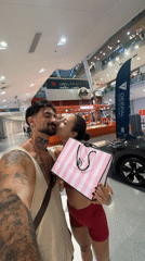 Couple shops at Victoria's Secret store in Thailand mall