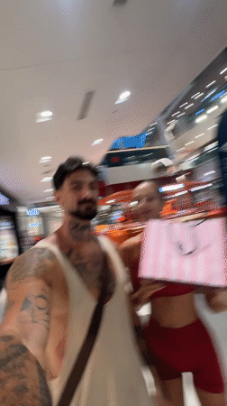 Couple shops at Victoria's Secret store in Thailand mall