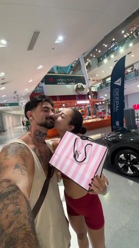 Couple shops at Victoria's Secret store in Thailand mall