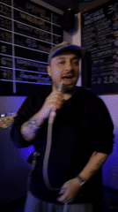 Live music performance at Montenegro bar features singer and bassist