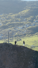 Visitors enjoy scenic overlook at Tbilisi's historic Narikala Fortress