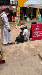 Daily street life documented in Lokoja, Nigeria commercial district