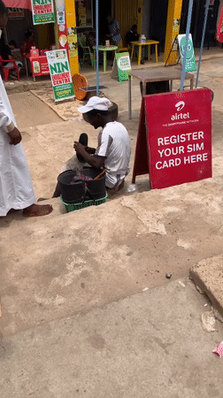 Daily street life documented in Lokoja, Nigeria commercial district