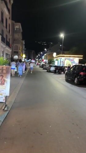 Budva's waterfront promenade on a busy summer night