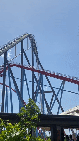 Roller coaster climbs steep tracks in Salou amusement park