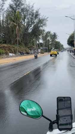 Rainy morning street life documented in Vietnamese ward