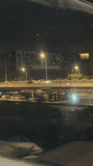 Nighttime traffic scene captured from vehicle in Beijing district