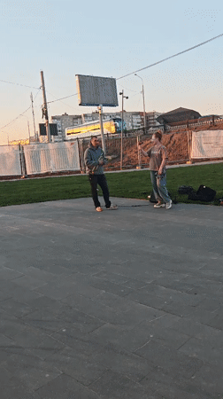 Street musician performs near cathedral in Noginsk, Russia