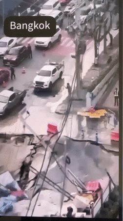 Major sinkhole opens in Bangkok street, vehicles stranded
