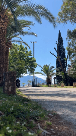 Woman enjoys morning walk near Budva marina