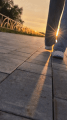 Urban sunset documented across multiple city walkways and streets