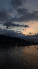 Twilight captured over coastal waters in Abang, Indonesia