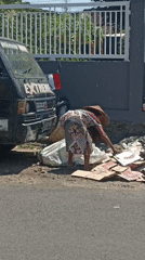 Everyday street activity on a sunny morning in Mojopanggung