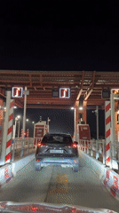 Toyota SUV passes through toll booth in Morocco