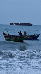 Traditional fishing boats working the waters off Lhokseumawe