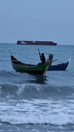 Traditional fishing boats working the waters off Lhokseumawe