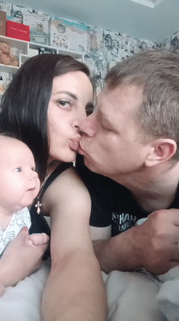 Young family shares quiet moments with newborn in Andreyevo home