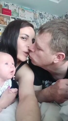 Young family shares quiet moments with newborn in Andreyevo home
