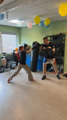 Kickboxing training session with children and adults in Noordwijk