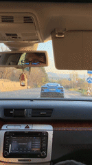 Driver travels through Vladaya, Bulgaria on sunny afternoon