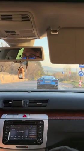 Driver travels through Vladaya, Bulgaria on sunny afternoon