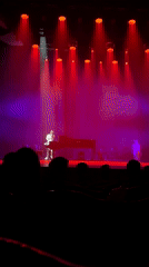 Theatrical performance with piano staged in ornate Perm venue