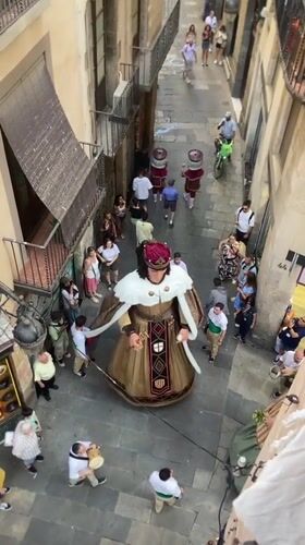 Gegants parade through Barcelona's old quarter streets